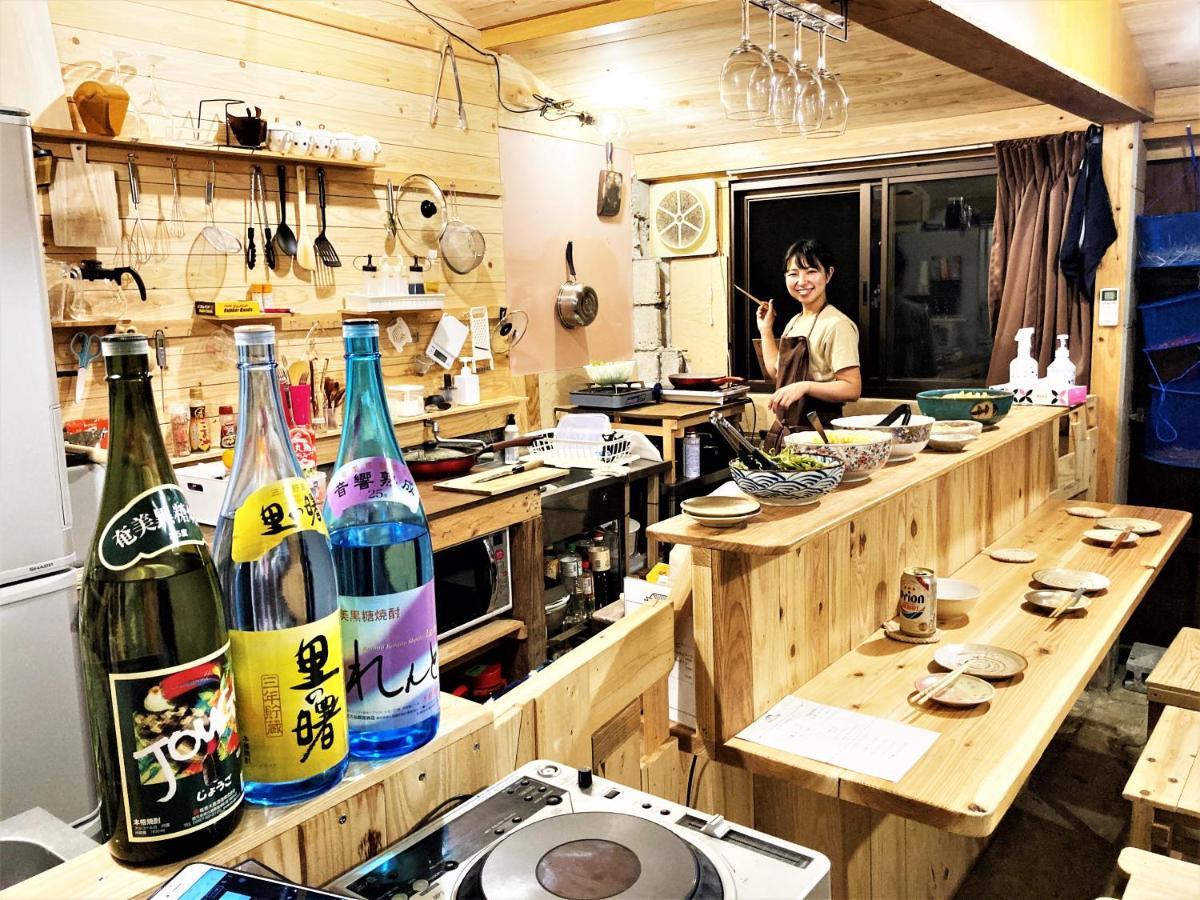 奄美ゲストハウス Hub A Nice Inn Setouchi  Exteriör bild