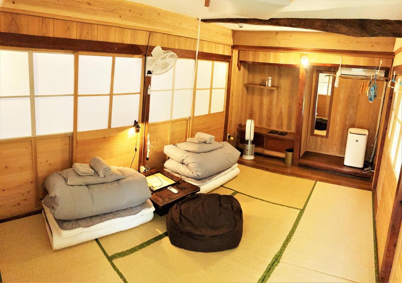 奄美ゲストハウス Hub A Nice Inn Setouchi  Exteriör bild