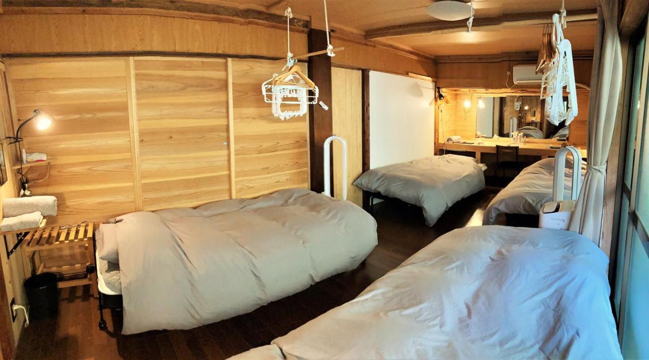 奄美ゲストハウス Hub A Nice Inn Setouchi  Exteriör bild