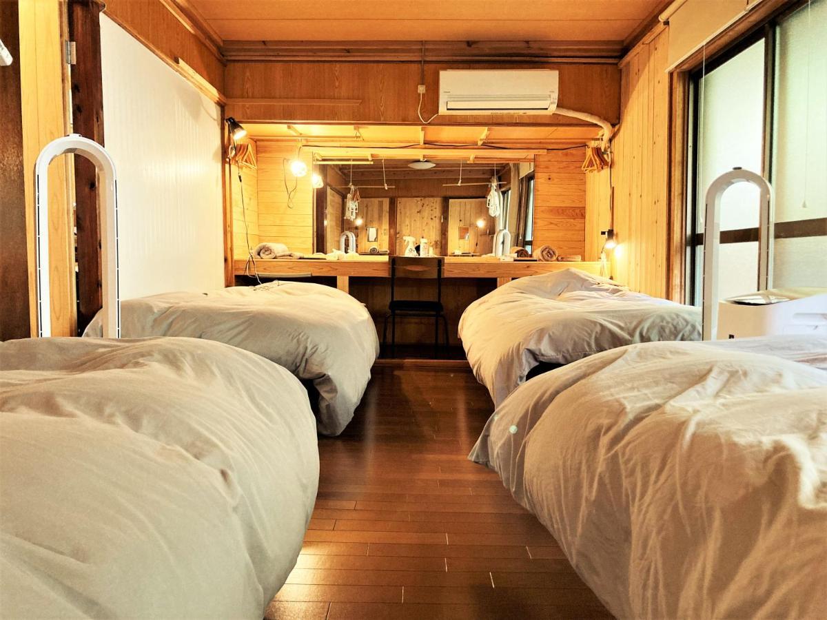 奄美ゲストハウス Hub A Nice Inn Setouchi  Exteriör bild